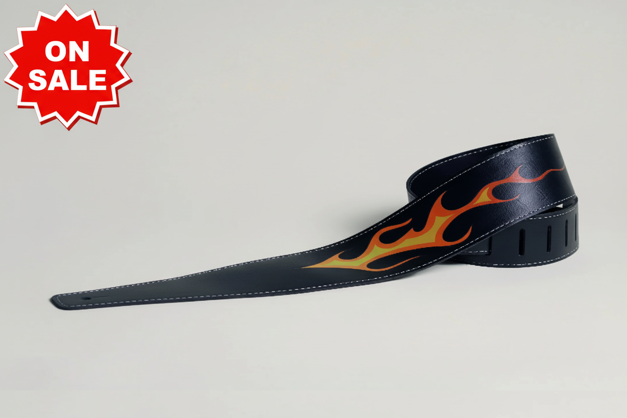Black guitar strap with flame pattern on a light gray background